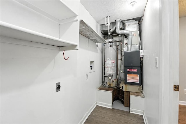 12704 W 110th Ter, Overland Park, KS 66210 - utility room featuring water heater and heating unit