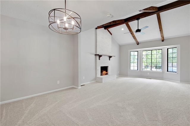 11016 W 96th Ter, Overland Park, KS 66214 - unfurnished living room with ceiling fan, carpet floors, beamed ceiling, a fireplace, and a chandelier