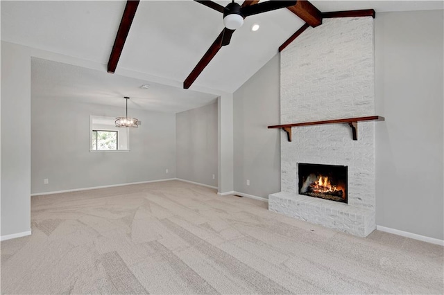 11016 W 96th Ter, Overland Park, KS 66214 - unfurnished living room with a ceiling fan, carpet flooring, a brick fireplace, and a chandelier