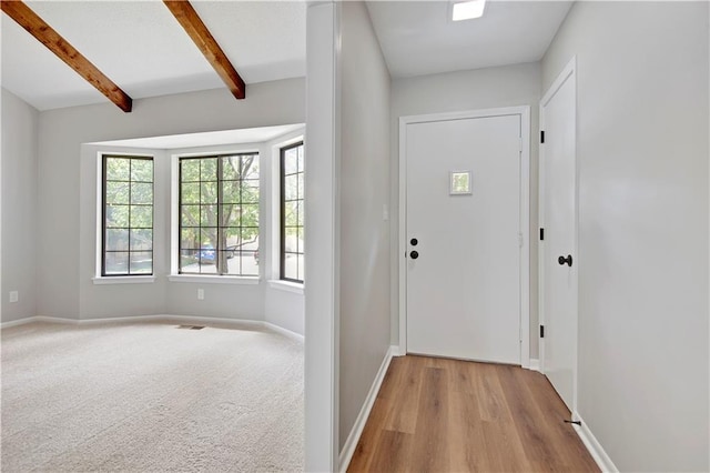 11016 W 96th Ter, Overland Park, KS 66214 - foyer with plenty of natural light, beam ceiling, and wood finished floors