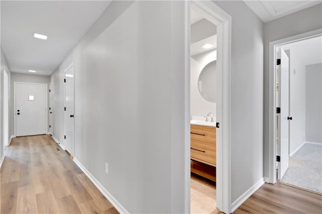11016 W 96th Ter, Overland Park, KS 66214 - corridor featuring light wood finished floors and baseboards