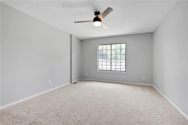 11016 W 96th Ter, Overland Park, KS 66214 - carpeted spare room featuring a textured ceiling and a ceiling fan