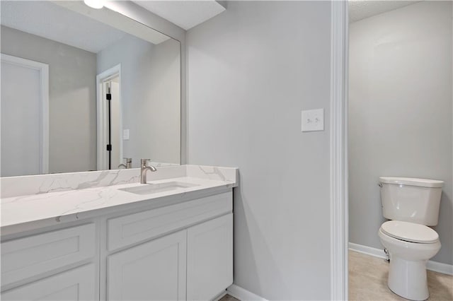 11016 W 96th Ter, Overland Park, KS 66214 - bathroom featuring vanity and a textured ceiling