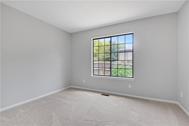11016 W 96th Ter, Overland Park, KS 66214 - carpeted spare room featuring baseboards