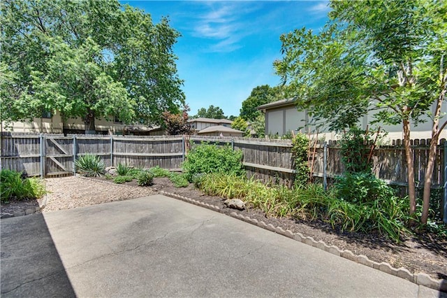 11016 W 96th Ter, Overland Park, KS 66214 - fenced backyard featuring a patio