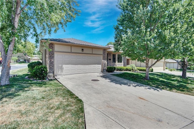11016 W 96th Ter, Overland Park, KS 66214 - ranch-style home with an attached garage, concrete driveway, a front lawn, and brick siding