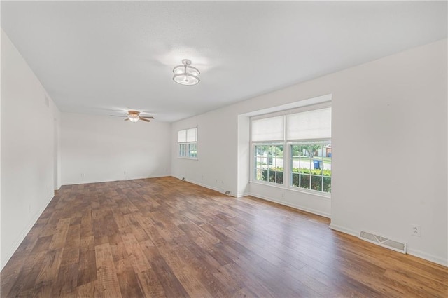 38 Hillcrest Dr, Platte City, MO 64079 - empty room with ceiling fan and wood finished floors