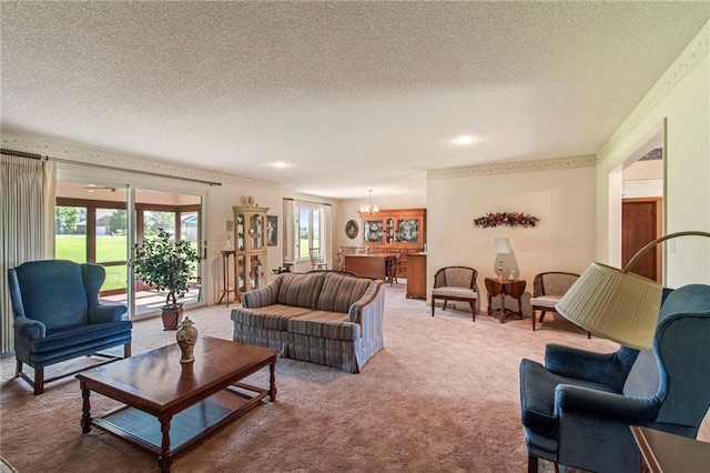 205 E 10th St, Carrollton, MO 64633 - carpeted living room featuring a textured ceiling and a chandelier