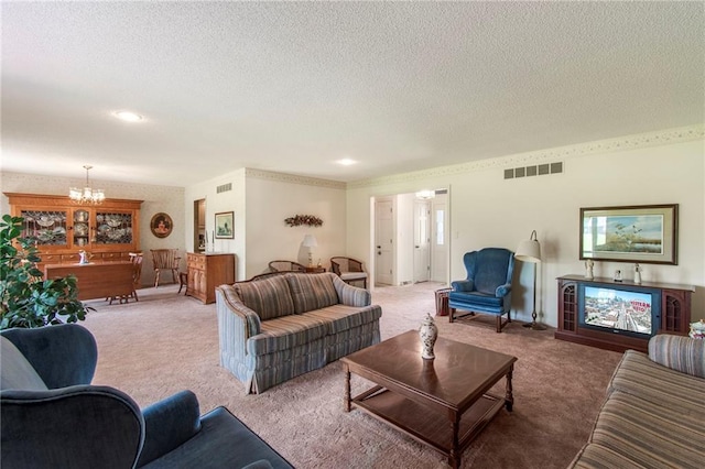 205 E 10th St, Carrollton, MO 64633 - carpeted living area featuring a chandelier and a textured ceiling