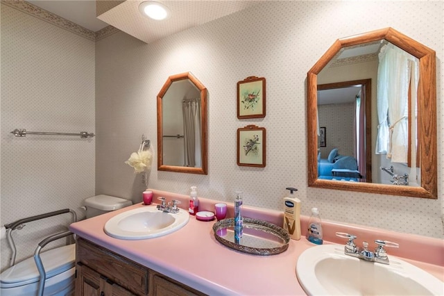 205 E 10th St, Carrollton, MO 64633 - bathroom with double vanity and wallpapered walls