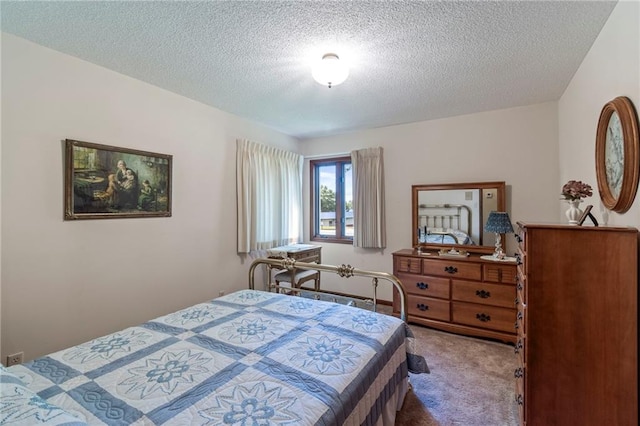 205 E 10th St, Carrollton, MO 64633 - bedroom with carpet flooring and a textured ceiling