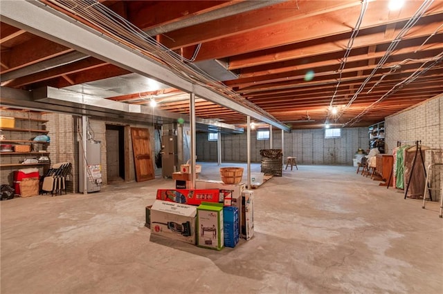 205 E 10th St, Carrollton, MO 64633 - unfinished basement featuring water heater