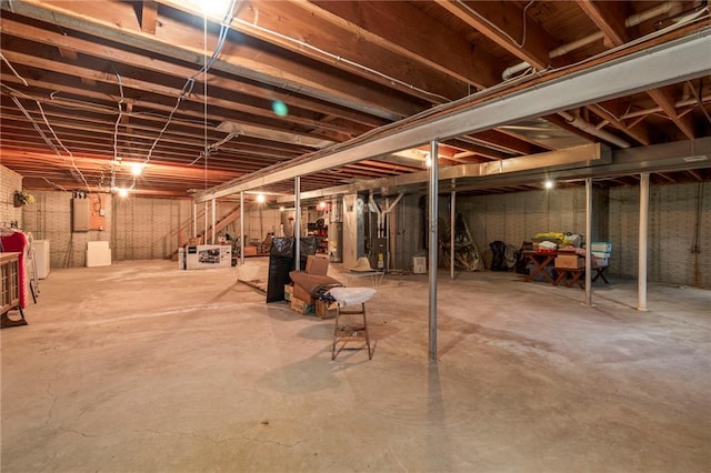 205 E 10th St, Carrollton, MO 64633 - unfinished below grade area featuring electric panel
