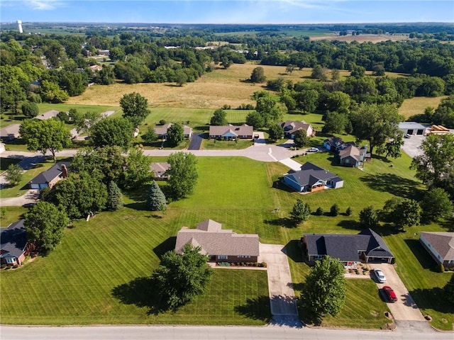 205 E 10th St, Carrollton, MO 64633 - aerial perspective of suburban area