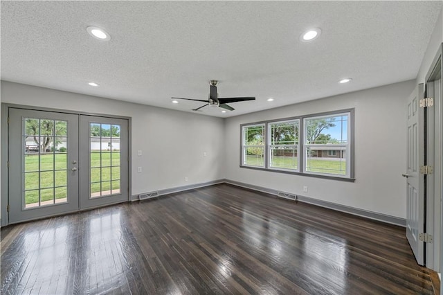 2517 Red Bridge Ter, Kansas City, MO 64131 - spare room featuring french doors, dark wood-style floors, a ceiling fan, a textured ceiling, and recessed lighting