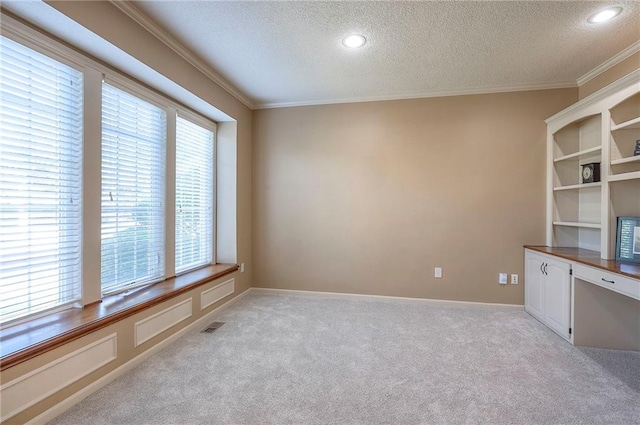 12337 Gillette St, Overland Park, KS 66213 - unfurnished office with a textured ceiling, crown molding, light colored carpet, and recessed lighting