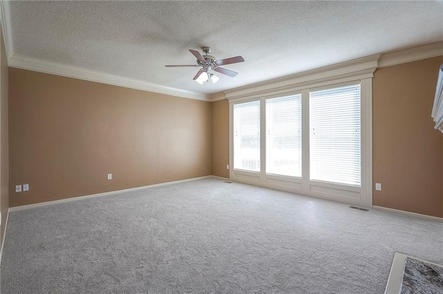12337 Gillette St, Overland Park, KS 66213 - carpeted empty room featuring a ceiling fan, crown molding, and a textured ceiling