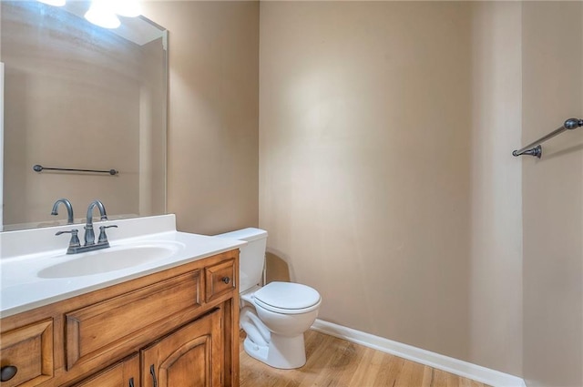12337 Gillette St, Overland Park, KS 66213 - bathroom with wood finished floors and vanity