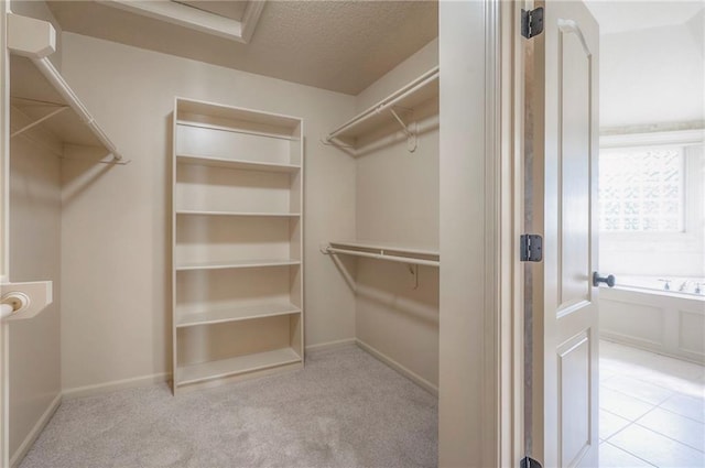 12337 Gillette St, Overland Park, KS 66213 - walk in closet with carpet flooring and attic access