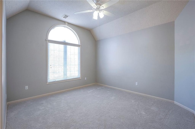 12337 Gillette St, Overland Park, KS 66213 - unfurnished room featuring lofted ceiling, a textured ceiling, a ceiling fan, and carpet
