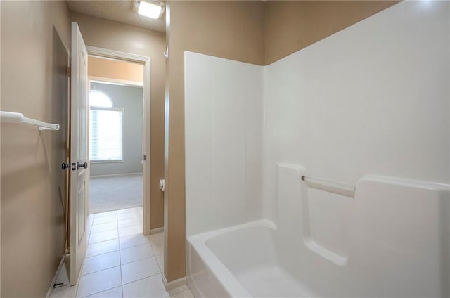 12337 Gillette St, Overland Park, KS 66213 - bathroom featuring tile patterned floors and  shower combination