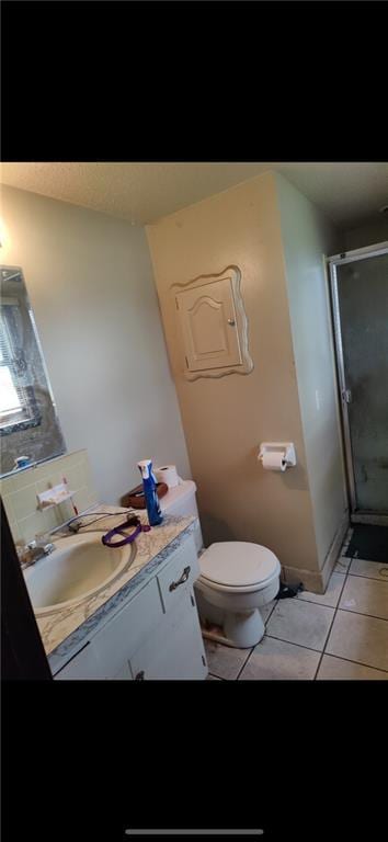 505 E Harold St, Olathe, KS 66061 - full bathroom with vanity, tile patterned floors, and a stall shower
