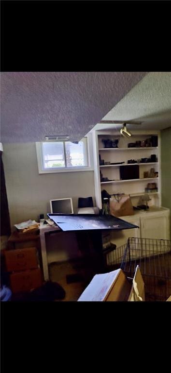 505 E Harold St, Olathe, KS 66061 - bar area with a textured ceiling