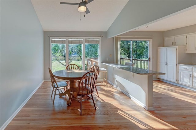 6236 W 156th St, Overland Park, KS 66223 - dining room with lofted ceiling, plenty of natural light, a ceiling fan, and light wood finished floors