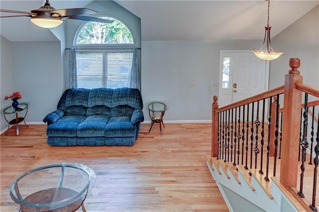 6236 W 156th St, Overland Park, KS 66223 - living room with wood finished floors, ceiling fan, and vaulted ceiling