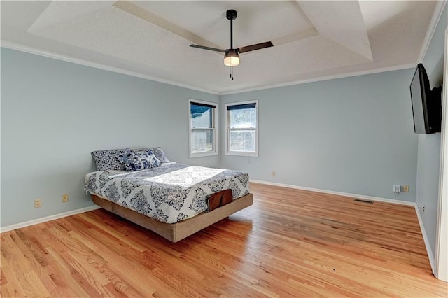 6236 W 156th St, Overland Park, KS 66223 - bedroom with a tray ceiling, light wood finished floors, ornamental molding, and ceiling fan