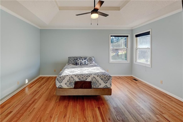 6236 W 156th St, Overland Park, KS 66223 - bedroom featuring wood finished floors, ornamental molding, ceiling fan, and a textured ceiling