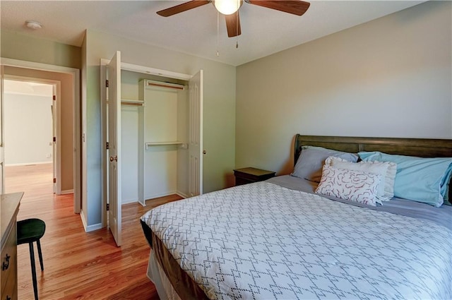6236 W 156th St, Overland Park, KS 66223 - bedroom with light wood finished floors, a closet, and ceiling fan