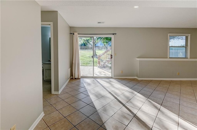 6236 W 156th St, Overland Park, KS 66223 - empty room with light tile patterned floors and baseboards