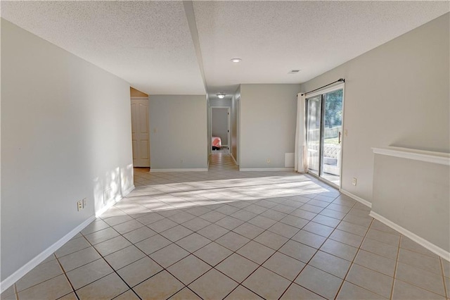 6236 W 156th St, Overland Park, KS 66223 - unfurnished room with a textured ceiling, light tile patterned flooring, and recessed lighting
