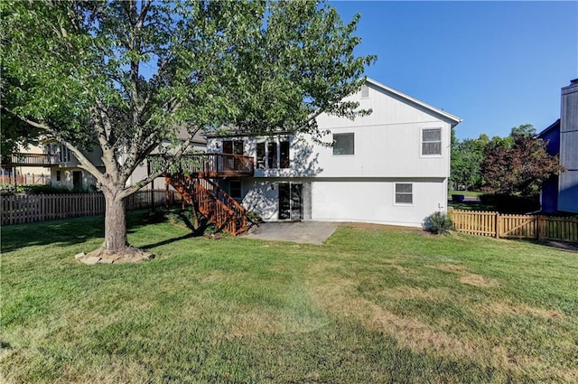 6236 W 156th St, Overland Park, KS 66223 - back of house with stairs, a fenced backyard, and a deck
