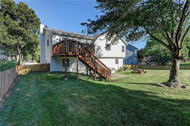 6236 W 156th St, Overland Park, KS 66223 - rear view of house with stairway, a fenced backyard, a deck, and a chimney