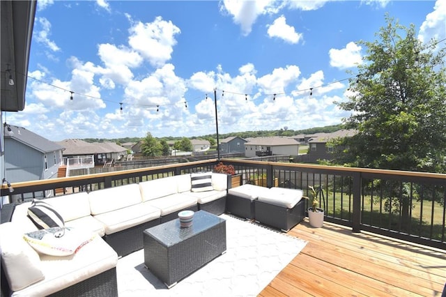 1207 SW 9th St, Oak Grove, MO 64075 - wooden deck with an outdoor living space and a residential view