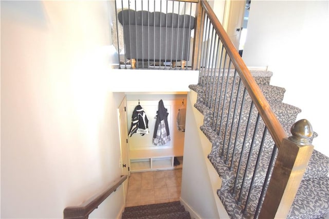 1207 SW 9th St, Oak Grove, MO 64075 - staircase featuring tile patterned floors