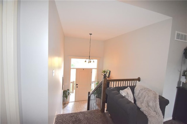 1207 SW 9th St, Oak Grove, MO 64075 - entryway featuring a chandelier
