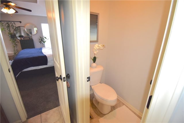 1207 SW 9th St, Oak Grove, MO 64075 - ensuite bathroom featuring ceiling fan and tile patterned flooring