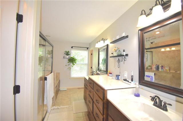 1207 SW 9th St, Oak Grove, MO 64075 - bathroom featuring tile patterned flooring, vanity, and an enclosed shower