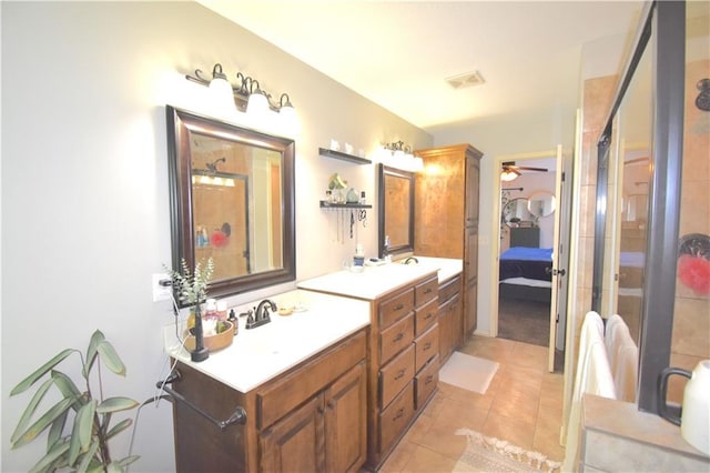 1207 SW 9th St, Oak Grove, MO 64075 - ensuite bathroom featuring vanity, tile patterned floors, ceiling fan, and an enclosed shower