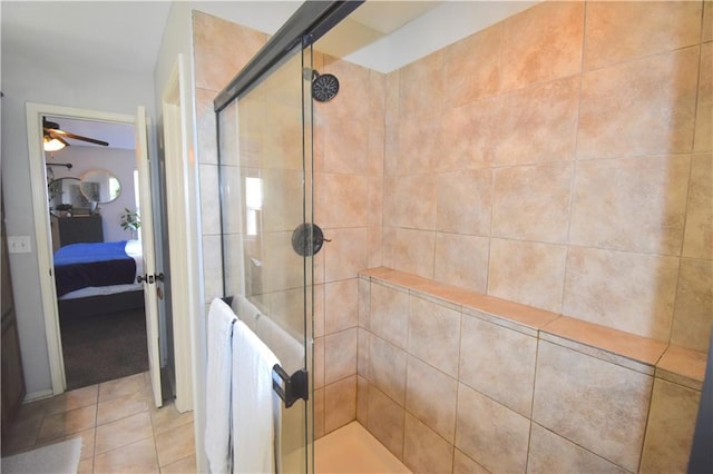 1207 SW 9th St, Oak Grove, MO 64075 - ensuite bathroom with a shower stall, a ceiling fan, and tile patterned flooring