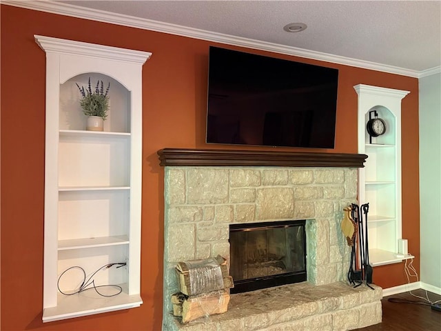 4531 Anderson St, Shawnee, KS 66226 - detailed view of built in shelves, wood finished floors, a glass covered fireplace, and ornamental molding