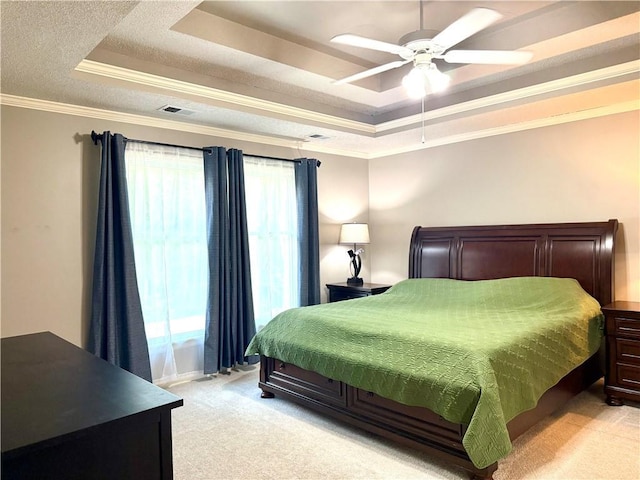 4531 Anderson St, Shawnee, KS 66226 - bedroom with a tray ceiling, light colored carpet, ornamental molding, and a ceiling fan