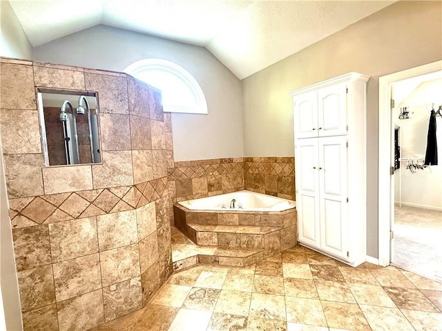 4531 Anderson St, Shawnee, KS 66226 - full bath with a garden tub, a closet, and vaulted ceiling