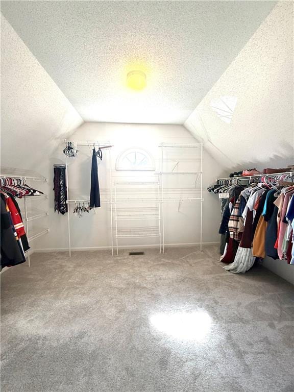 4531 Anderson St, Shawnee, KS 66226 - spacious closet with lofted ceiling and carpet floors