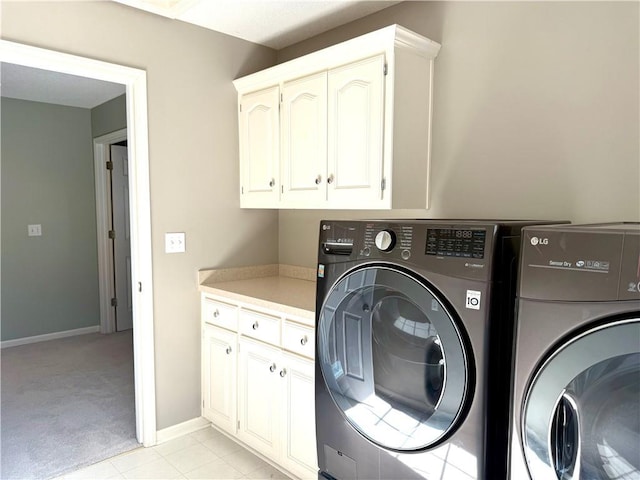 4531 Anderson St, Shawnee, KS 66226 - laundry room with washer and dryer, cabinet space, and light carpet