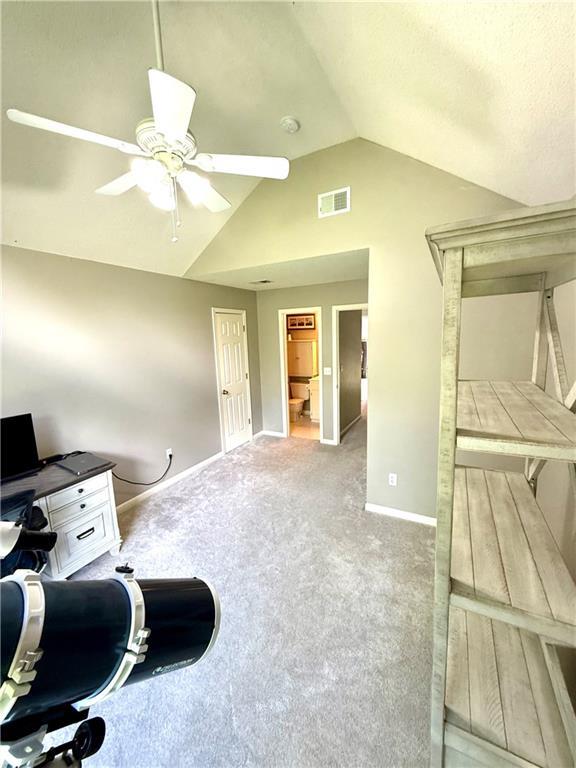 4531 Anderson St, Shawnee, KS 66226 - office with ceiling fan, carpet flooring, and vaulted ceiling