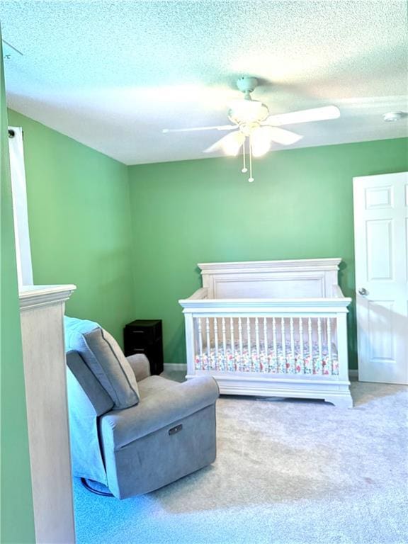 4531 Anderson St, Shawnee, KS 66226 - bedroom with a textured ceiling, carpet flooring, and ceiling fan